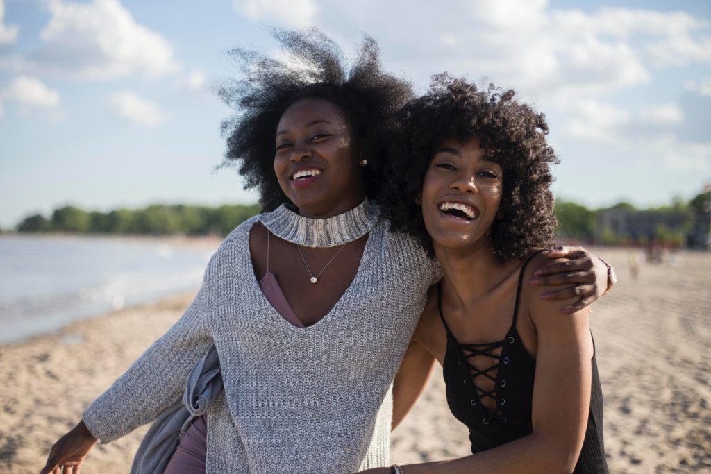 black women smiling