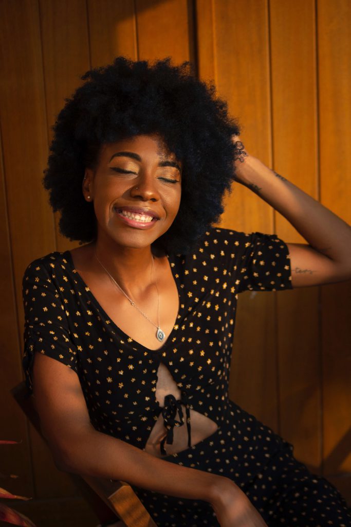 woman with hand in hair